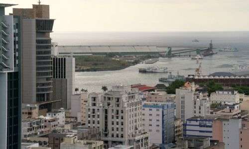 View of Port Louis and her harbour with the Bank of Mauritius tower on the left. The tallest building on the island View of Port Louis with harbour and the Bank of Mauritius Tower on the left